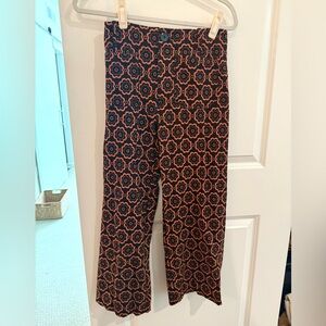 Anthropologie Maeve Black & Orange Floral Pants
